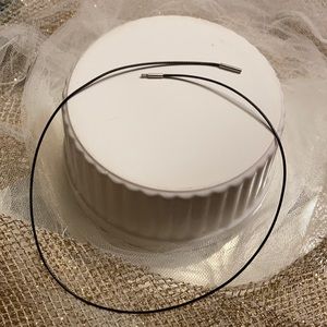 Black rope cord with spring loaded screw clasp, child proof, sturdy, thin